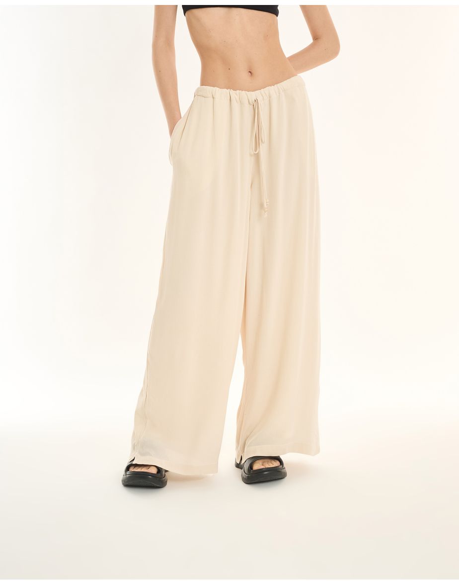 Calça crepon ess bege